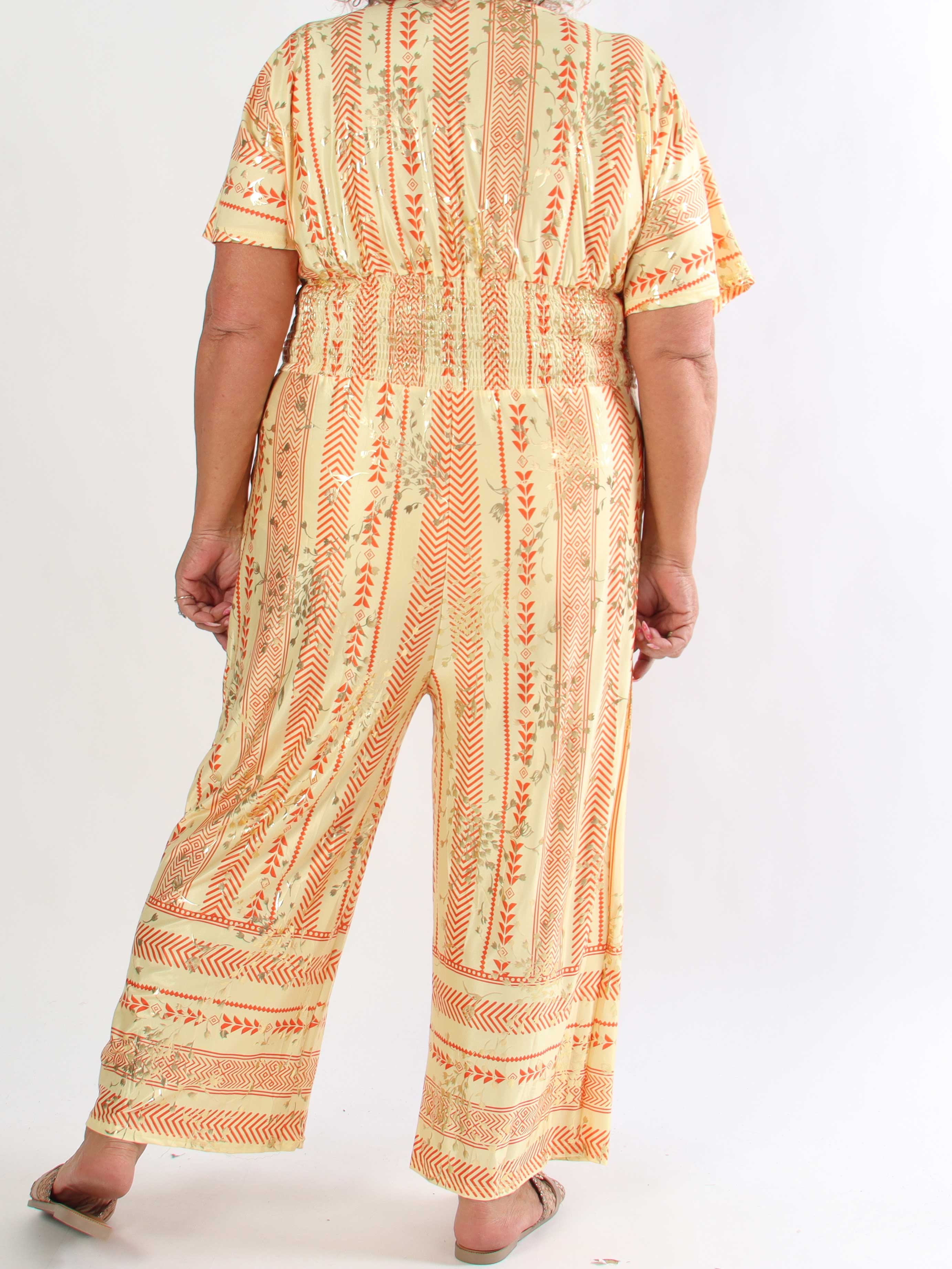 Pams Tribal Jumpsuit - Plus size mønstret buksedragt med små guld blomster